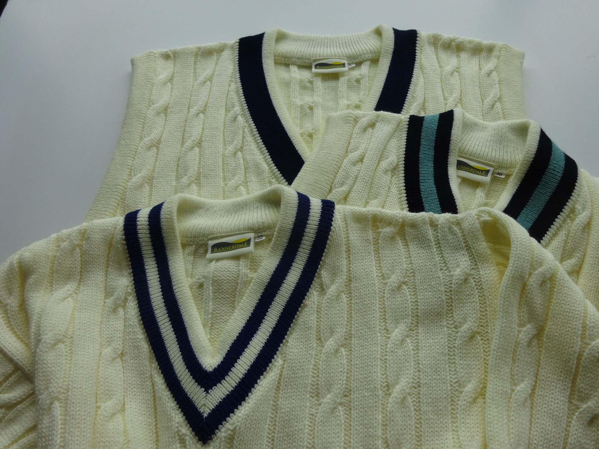 Cricket sweaters in club and school colours. Low minimum orders.